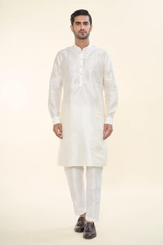 Off white solid kurta. Paired with a Nehru Jacket with diamond motif embroidery and a matching mexican pant. - Aza Fashions Classic White Sherwani For Festive Occasions, Classic White Traditional Wear For Festive Season, Classic White Bandhgala For Festive Occasions, White Classic Kurta For Formal Occasions, Classic White Kurta For Festive Occasions, Classic White Formal Kurta, White Fitted Kurta With Stand Collar, Classic White Sherwani For Eid, White Nehru Jacket With Naqshi Detailing