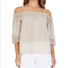 When The Weather Turns Warm, Go For Classic Off-The-Shoulder Style With Bcx's Textured Top, Finished With Crochet Trim. Approx. 24 1/2” Long Relaxed Fit Off-The-Shoulder Neckline Crochet Trim; Textured Fabric 3/4-Sleeves; Adjustable Shoulder Straps Rayon/Polyester Machine Washable Imported Color: Sand Crochet Trim Top, White Crochet Top, Layered Tank Top, White Floral Top, White Sleeveless Blouse, Textured Top, Lace Trim Top, Sweater Crop, Trim Top