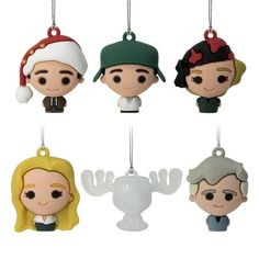 four christmas ornament hanging from strings in various styles and colors, each with an individual's face