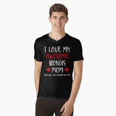 a man wearing a black t - shirt that says i love my awesome mom