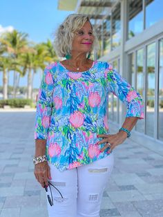 92% Nylon / 8% Spandex. Cathy is 5'6 and wearing a size medium Stretch knit top. Scoop neckline. 3/4 sleeve. Asymmetrical hemline. UPF 50 sun protection. Pre-shrunk. Center back length: 25 inches. Machine wash. Imported. Online and in stores. Style Number: SPX0639 CRMC Summer Stretch Tops With Upf 50+, Summer Tops With Upf 50+ And Stretch, Fitted Half Sleeve Beach Tops, Stretch Scoop Neck Vacation Tops, Stretch Scoop Neck Top For Vacation, Spring Crew Neck Tops With Upf 50+, Fitted Beach Top With 3/4 Sleeves, Fitted Top With 3/4 Sleeve For Beach, Fitted 3/4 Sleeve Top For Beach