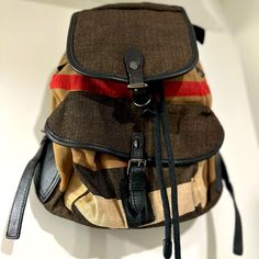 Gorgeous “Burberry Canvas Black/Red/White Backpack With Leather Straps! Lightly Used In Good Condition One Strap Did Come Off Needs Some Repair Burberry Backpack Women, White Backpack, Canvas Backpack, Burberry Bag, Black Tan, Black And Tan, Black Red, Leather Straps, Burberry