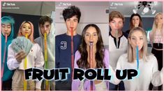 a group of people standing next to each other with the words fruit roll up on them