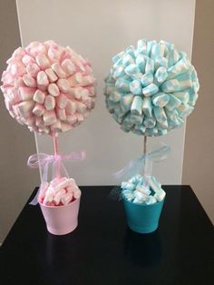 there are two candy balls on top of each other in the shape of lollipops