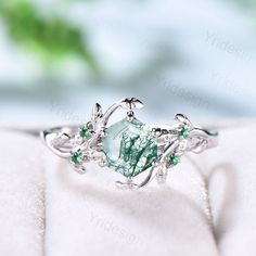 Every moss agate is natural and no two moss agate stones are the same, making each one unique. please be reminded that it is normal for the finished ring to look a little different from our pictures. Each people have their own idea about the beauty of moss agate, I provide SELECT MOSS AGATE STONE SERVICE : https://www.etsy.com/listing/1260655702/pick-your-special-moss-agate?click_key=cccb25b540cbcb04882377535e15bc926b3765e7%3A1260655702&click_sum=f0defebd&ref=shop_home_active_1&frs=1&sts=1 Same Beautiful Emerald Ring, Nature Promise Rings, Engagement Rings Mystical, Forest Ring Engagement, Green Gem Wedding Ring, Fantasy Promise Rings, Nature Inspired Wedding Ring Sets, Engagement Rings Forest, Unusual Rings Engagement