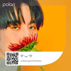 a young man holding a flower in front of his face with the word polar on it