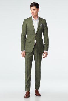 For those of you with a taste for the finer things in life, there's the delightfully detailed Stockport Suit. This fabric's unique weave, containing dyed wool and just a hint of ultra-thin raw linen, gives it a uniquely geometric texture-that only looks better the closer you get. Mens Bridal Suits, Summer Wedding Suits Men Guest, Olive Suit Wedding, Olive Suit, Custom Blazer, Green Suit Men, Olive Blazer, Desert Tones, Olive Green Suit