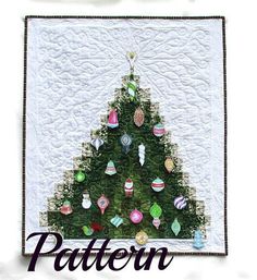 a quilted christmas tree with ornaments on it and the words pattern written in black