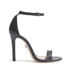 PRICES MAY VARY. Leather sole Heel: 4in / 100mm Stiletto heel A minimalist, two-strap sandal that's a must-have for every closet. These Schutz Cadey Lee Sandals keep things simple with slim straps and a goes-with-everything color. Two Strap Sandals, Rubber Patch, High Heel Dress, Croc Print, Stiletto Sandals, Leather High Heels, Pencil Skirts, Round Toe Heels, Cropped Trousers