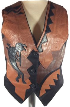 Vintage 1996 Pietra C. Wall Elegantissimo By Piero (?) see Pictures Black Canvas/Leather Vest Tribal Kokopelli & Multi Leather Design Front/Back Stunning Beautiful Wearable Art Vintage Circa 1996 Condition- Vintage pre-owned but new condition absolutely no wear whatsoever pristine Measurements: (Laid Flat) Armpit to Armpit 18” Across Front shoulder to longest “V” tip- 25” Back Neckline to Hemline - 18” Shipped with USPS Priority Mail. Western Vest, Leather Vest, Black Canvas, Leather Design, Canvas Leather, Art Vintage, Wearable Art, Wedge Boot, Priority Mail