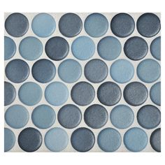 a blue and white tile with circles on the bottom, in various sizes and colors