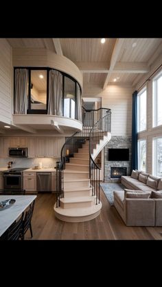 a living room filled with furniture and a spiral staircase