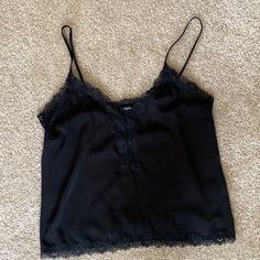 Black Spaghetti Strap Tank Top With Lace Trim. Never Worn. Trendy Black Camisole For Night Out, Trendy Black Tank Top For Date Night, Forever 21 Camisole For Night Out, Black Tank Camisole For Day Out, Chic Forever 21 Camisole, Trendy Forever 21 Cami Tank Top, Trendy Forever 21 Spaghetti Strap Top, Chic Forever 21 Cami Tank Top, Black Camisole Tank Top For Day Out