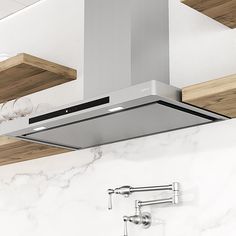 a stainless steel range hood mounted on the side of a wall above a sink and faucet