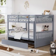 a child's bedroom with bunk beds and toys