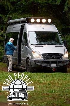 an older man standing in front of a van