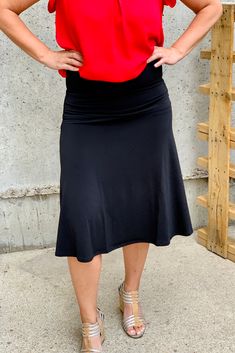 Equipped with a fold-over waistband and an A-line flared silhouette, this skirt boasts stretchy fabric in a basic Black hue. 95% Polyester / 5% Spandex Total body length: 28" / Waist: 23" (measured from Small) Total body length: 29.5" / Waist: 31" (measured from 1X) Fit Notes: Fits slightly small. Jaime is 5'7" and is modeling a size Medium. ------------LAST ONE - SIZE 3X-------- NOTE: All items with prices ending in .19 are considered closeout/clearance items that we will not be restocking. Las Solid Color Stretch Maxi Flared Skirt, Stretch Flared Maxi Skirt In Solid Color, Stretch Flared Maxi Skirt, Solid Color Skirt With Wide Waistband And 4-way Stretch, Flattering Black Stretch Skirt, Flattering Stretch Black Skirt, Black 4-way Stretch Skirt For Spring, Flattering Black Lined Skirt, Black Relaxed Flattering Skirt