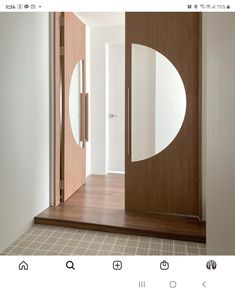 an open door with a mirror on the front and side of it in a room