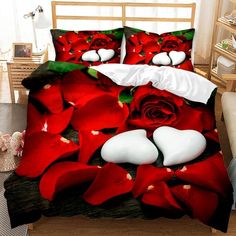 a bed with red roses and white hearts on it