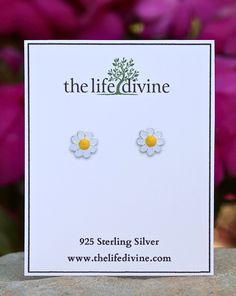 Sterling Silver White and Yellow Daisy Stud Earrings Our Sterling White and Yellow Daisy Earrings measure 3/8" Round or 8 mmThe earrings are presented on a custom printed earring card which is inside a jewelry box. 925 Sterling Silver White Sterling Silver Earrings For Mother's Day, White Sterling Silver Earrings For Birthday, Hypoallergenic White Earrings For Mother's Day, Hypoallergenic White Earrings For Birthday, Small White Earrings For Gift, Personalized White Earrings For Mother's Day, Daisy Studs, Earring Card, Yellow Daisy