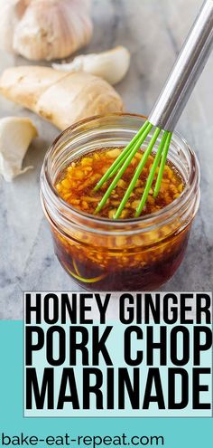 honey ginger pork chop marinade in a jar with green onions