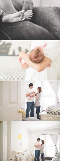 two people standing next to each other in front of a baby crib with their hands on the bed