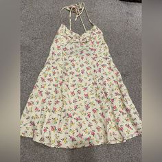 Zara Floral Halter Mini Dress. Size Medium. Open Back With Zipper. 100% Polyester. No Stretch In The Material But It Is Super Soft. Mini Style. Approx 25.5 From Highest Point Of Neckline To Hem. Approx 18 From Lowest Point Of Back To Hem. Cute Yellow Spaghetti Strap Dress, Cute Yellow Dress With Spaghetti Straps, Cute Yellow Dresses With Spaghetti Straps, Zara Fitted Sundress For Daytime, Casual Cream Mini Dress With Spaghetti Straps, Cute Floral Print Mini Dress For Daytime, Cute Mini Dress With Floral Print For Daytime, Cream Floral Print Sundress For Day Out, Cute Zara Mini Dress For Spring