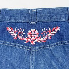 Vintage 1970s high waisted jeans featuring; a zip fly with single snap at the waist a high waisted cut with belt loops at the waist pockets at the hips straight leg a garland of flowers is embroidered in the center on the back just under the waistband white top stitching Of a mid weight, 100% cotton denim in a medium blue wash, the embroidery is done in pink and white. With no labels or tags, measurements when laid out flat are; 11 1/2 inches at the waist 17 inches at the hip 12 inch rise 28 3/4 inch inseam In good, preworn, vintage condition with no holes or funky odors, it has a spot of something gray low on one leg...this may soak out ...if not these would make great cut offs! We are happy to ship internationally and combine shipping. Vintage Embroidered Denim Blue Bottoms, Retro Embroidered Denim Bottoms, Retro Embroidered Bottoms For Spring, Vintage Embroidered Denim Bottoms, Vintage Denim Jeans With Floral Embroidery, Vintage Embroidered Straight Leg Bottoms, Retro Spring Jeans With Belt Loops, 60s Jeans, Garland Of Flowers