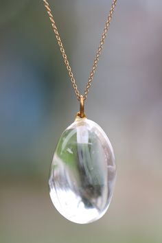 "Crystal necklace - quartz crystal necklace - Healing necklace - a perfectly polished rose quartz on a 14k gold vermeil chain - QUB This beautiful polished clear quartz crystal hangs from an 18 inch 14k gold vermeil chain. Please feel free to select a different length chain if you prefer! Because of nature and all its beauty, no two of these stones will ever be the same. Shape, size and clarity will vary. The stone you will receive will measure approximately one inch. Need a few reasons to love Elegant Clear Quartz Crystal Necklace, Clear Pendant Necklace For Healing, Clear Drop Necklace As A Gift, Elegant Clear Necklace For Healing, Clear Drop Necklace For Gifts, Clear Drop Necklace For Gift, Clear Drop Necklace For Gifting, Elegant Necklace With Large Clear Pendant, Elegant Clear Necklace With Large Pendant