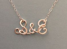 "Solid Sterling Silver wire is hand-formed and hammered. Perfect gift for your partner, friend, family or someone special. Initial&initial size: approx. 1/2\" height x 1\" width *Please leave your 2 initials in the note to seller box. . *Please choose your length from the selection box. *Gold (gold filled) version: https://www.etsy.com/listing/211178657/two-initials-necklace-with-ampersand-14k?ref=shop_home_active_22 Thank you." Simple Sterling Silver Initial Necklace, Sterling Silver Initial Necklace For Wedding, Silver Sterling Initial Necklace For Wedding, Simple Sterling Silver Initial Necklace For Anniversary, Silver Dainty Handmade Initial Necklace, Dainty Handmade Silver Initial Necklace, Minimalist Sterling Silver Initial Necklace For Anniversary, Dainty Sterling Silver Initial Necklace For Anniversary, Silver Initial Pendant Necklace For Anniversary