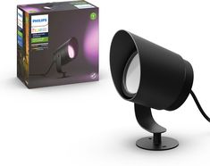 a black lamp is next to a box