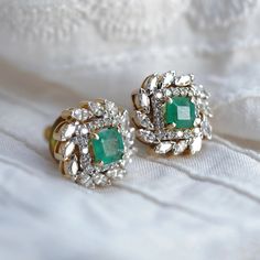 Our take on classic solitaire studs, the Eden holds a faceted gemstone at its heart, with pave-set diamonds and prong-set marquise diamonds giving it company. Diamond Ear Studs, It Company, The Eden, Solitaire Studs, Marquise Diamond, Ear Studs, Prong Setting, Eden, Emerald