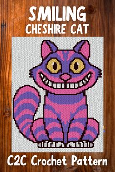 a cross stitch pattern for a cat with big eyes and fangs on it's face