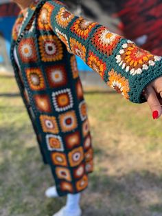 a woman holding the hand of another person