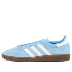 Find ADIDAS Handball Spzl Sneakers on Editorialist. From the court to the terraces, adidas’ Handball Spezial is a subcultural favourite. It debuted in 1979, and this pair stays true to the OG’s roots. The upper is upgraded using texturally rich nubuck, but it retains those iconic serrated stripes. Elsewhere, the sole is gum rubber to drive home the vintage-casual aesthetic. Pigskin Nubuck Uppers, Leather Overlays, Gum Rubber Outsole, Lace Up Closure, Serrated 3-Stripes, Tongue and Heel Branding, Adidas Custom Sneakers With Gum Sole For Sports, Dark Gums, Adidas Handball, Profile Silhouette, Adidas Spezial, Black Friday Promotions, Sporty And Rich, Pig Skin, Vintage Casual