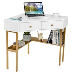 a laptop computer sitting on top of a white desk next to a shelf with books