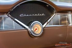 an old car with the word chevrolet on it's front grill and dash board