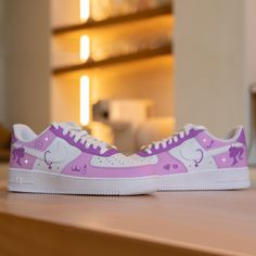 "Step up your sneaker game with the Custom Purple Girly Nike Air Force 1! Designed for bold risk-takers, these sneakers combine ultimate style with comfort. Stand out from the crowd and conquer any challenge with these statement-making kicks!" 🔥 100% genuine, Brand New.👟 Custom sneakers.★Every pair is hand-made and unique.✨Best quality waterproof and scratch-proof paints used.🎉 1000+ satisfied customers across various platforms.🎁 Treat the shoes as art as they are delicate and special.💌 We