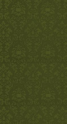 a green wallpaper with an ornate design