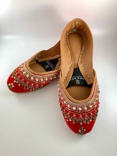 dhaage.london We Bring you our latest collection. These beautiful Red khussas/Juttis are handcrafted, incredibly soft and anti-slip sole. This will give you Comfort and style all in one!    . #jutti #khussa #shoes #punjabishoes #juttilovers #summer #desiclothes #casualshoes #indian #pakistani #desi #fashion #desifashion #kaleeray #accessories #tradionalshoes #handmade #summer #summervibes #wedding #desiwedding #partywear #eid #simplekhussa #pakistanifashion #punjabifashion #ladies #shoes Diwali Reception Flats, Bollywood Style Festive Flat Wedding Shoes, Bollywood Style Meenakari Flats For Wedding, Bollywood Meenakari Flats For Weddings, Bollywood Wedding Flats With Meenakari, Meenakari Slip-on Flats For Wedding, Bollywood Style Flat Wedding Shoes With Gota Work, Traditional Closed Toe Ballet Flats For Festive Occasions, Bollywood Style Wedding Shoes With Handwork