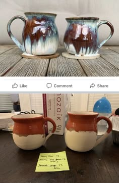 two mugs sitting on top of a wooden table