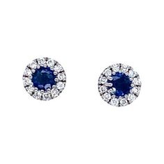 This pair of earrings features a primary sapphire stone surrounded by a stunning halo of pave-set diamonds, totaling 0.16ct in 18xt white gold setting.The earrings are stylish and elegant and are the perfect earrings for any occasion.With Peg + Screw Fittings Additional Information: Total Sapphire Weight: 0.30ct Total Diamond Weight: 0.16ct Diamond Colour: G Diamond Clarity: VS1 Total Weight: 1.6g Earring Dimension: 5.78mm SMS6976 Diamonds Earrings, Round Sapphire, Vs Diamond, Diamond Gold, Sapphire Stone, Diamond Clarity, Earrings Set, Jewelry Earrings Studs, Colored Diamonds