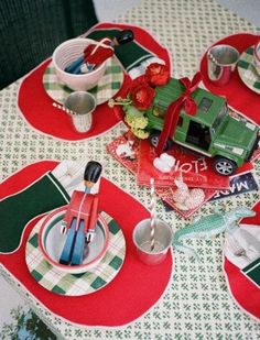 the table is set with red and green placemats