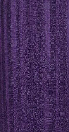 a purple curtain with wavy lines on it