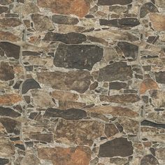 a stone wall with brown and tan colors