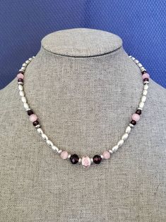 A uniquely styled Pink Rose necklace made of vibrant purple glass and pink tiger eye beads on silver-plated bead chain. Looks lovely with a variety of ensembles. An excellent gift for the woman you love. 2024 Beaded Jewelry Trends, Bead Necklace Ideas, Pink Bead Necklace, Pink Tiger, Beaded Jewelry Necklaces, Seed Beading, Vibrant Purple, Rose Necklace, Tiger Eye Beads