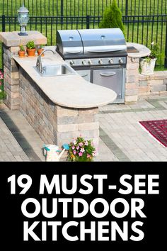 an outdoor kitchen with grill and sink