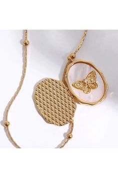 Material: Metal Elegant Locket Necklace With Adjustable Chain, Elegant Gold Butterfly Metal Necklace, Elegant Locket Necklace With Chain As Gift, Elegant Handmade Metal Locket Necklace, Feminine Chain Jewelry As A Gift, Elegant Adjustable Necklace With Butterfly Charm, Necklaces With Adjustable Chain Fashion Accessory, Elegant Handmade Adjustable Butterfly Necklace, Shell Butterfly