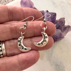 Sweet puff moon drop earrings. Celestial little dangle earrings with etched stars on the crescent moons. The moons are 5/8" long. The earrings dangle 1 3/4" on surgical steel ear wires. Double sided. Your moon earrings will come carded and bubble wrapped for safe travels. To see our whole shop: https://www.etsy.com/shop/Beadaboutique Any questions- just ask. Thanks for stopping by! Moon Earring, Moon Drop, Quirky Jewelry, Safe Travels, Crescent Moon Earrings, Dope Jewelry, Gift For Her Birthday, Funky Jewelry, Earrings Small