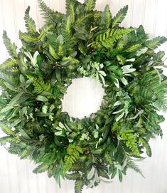 a green wreath hanging on the wall